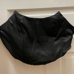 Black cropped corset top.